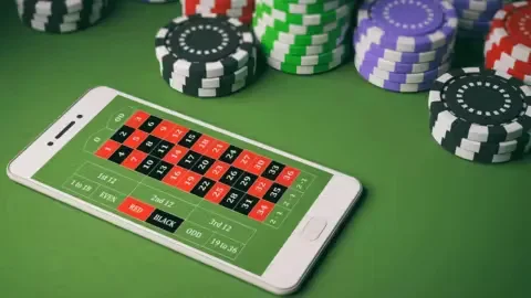 A stylish Bengali player exploring the massive 99XO mobile catalog on their smartphone.